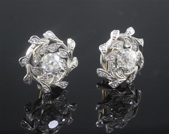 A pair of white gold and diamond cluster ear clips, 17mm.